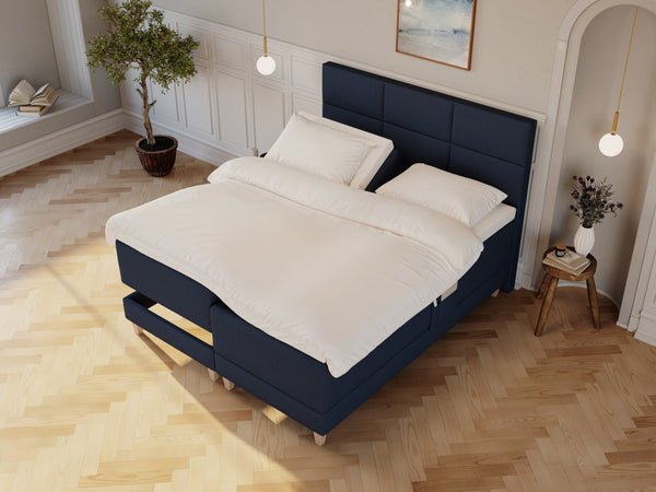 Aura Nordlys 180x200 Mørkeblå Nordic Dream tilbyr senger med skandinavisk design og materialer av høy kvalitet. Opplev perfekt komfort for en god natts søvn. Bestill din i dag!