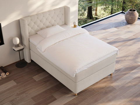 Eira Fjord 140x200 Bouclé cream Nordic Dream tilbyr senger med skandinavisk design og materialer av høy kvalitet. Opplev perfekt komfort for en god natts søvn. Bestill din i dag!
