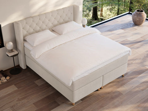 Eira Fjord 160x200 Bouclé cream Nordic Dream tilbyr senger med skandinavisk design og materialer av høy kvalitet. Opplev perfekt komfort for en god natts søvn. Bestill din i dag!