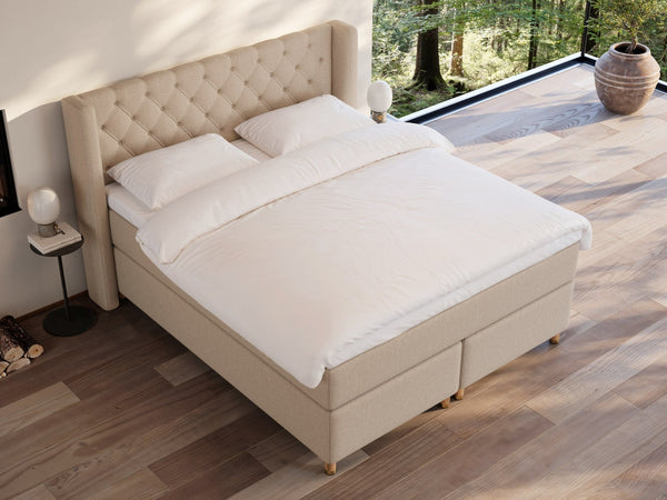 Eira Fjord 160x200 Sand Nordic Dream tilbyr senger med skandinavisk design og materialer av høy kvalitet. Opplev perfekt komfort for en god natts søvn. Bestill din i dag!