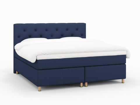 Nora Nordlys 200x200 Mørkeblå Nordic Dream tilbyr senger med skandinavisk design og materialer av høy kvalitet. Opplev perfekt komfort for en god natts søvn. Bestill din i dag!