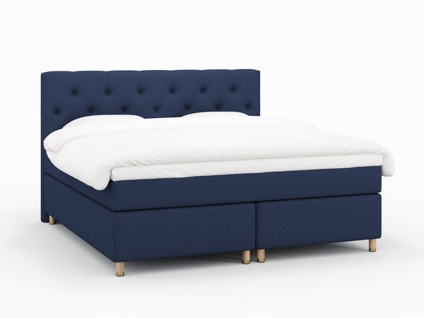 Nora Nordlys 200x200 Mørkeblå Nordic Dream tilbyr senger med skandinavisk design og materialer av høy kvalitet. Opplev perfekt komfort for en god natts søvn. Bestill din i dag!