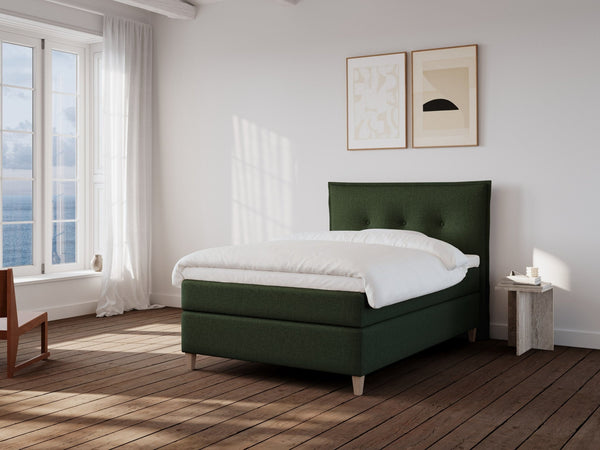 Snefrid Nordlys 140x200 Mørkegrøn Nordic Dream tilbyr senger med skandinavisk design og materialer av høy kvalitet. Opplev perfekt komfort for en god natts søvn. Bestill din i dag!