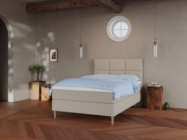Svanhild Älv 120x200 Sand Nordic Dream tilbyr senger med skandinavisk design og materialer av høy kvalitet. Opplev perfekt komfort for en god natts søvn. Bestill din i dag!