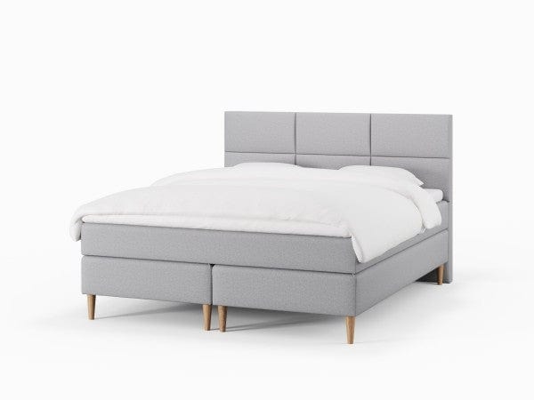 Svanhild Älv 160x200 Lysegrå Nordic Dream tilbyr senger med skandinavisk design og materialer av høy kvalitet. Opplev perfekt komfort for en god natts søvn. Bestill din i dag!