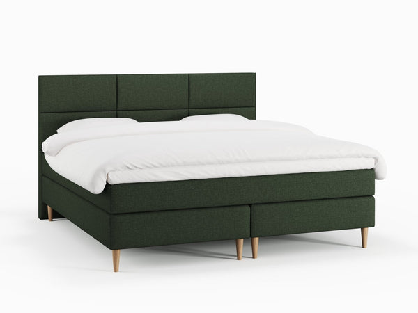 Svanhild Älv 210x210 Mørkegrøn Nordic Dream tilbyr senger med skandinavisk design og materialer av høy kvalitet. Opplev perfekt komfort for en god natts søvn. Bestill din i dag!
