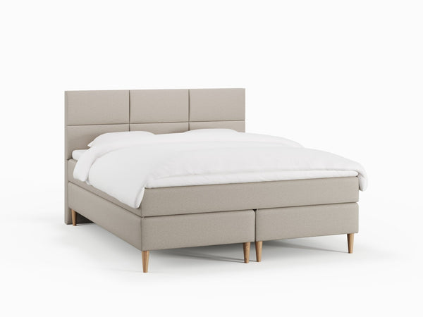 Svanhild Fjord 180x200 Sand Nordic Dream tilbyr senger med skandinavisk design og materialer av høy kvalitet. Opplev perfekt komfort for en god natts søvn. Bestill din i dag!
