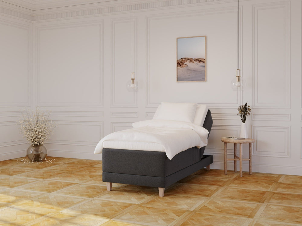 Aura Fjord 90x210 Antrasitt Nordic Dream tilbyr senger med skandinavisk design og materialer av høy kvalitet. Opplev perfekt komfort for en god natts søvn. Bestill din i dag!