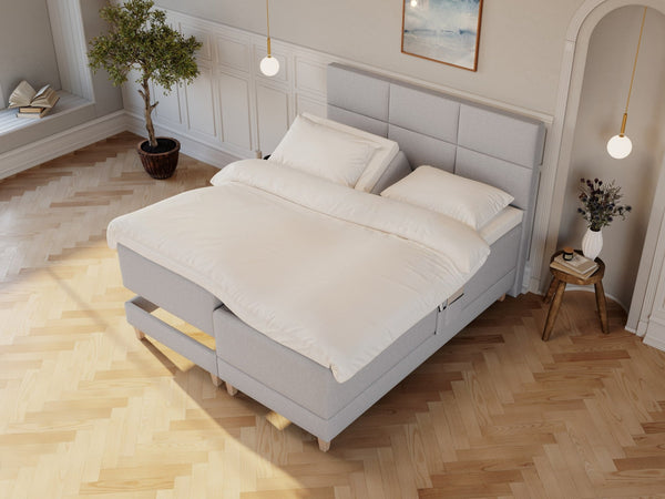 Aura Nordlys 160x200 Lysegrå Nordic Dream tilbyr senger med skandinavisk design og materialer av høy kvalitet. Opplev perfekt komfort for en god natts søvn. Bestill din i dag!