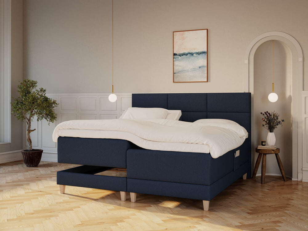 Aura Nordlys 210x210 Mørkeblå Nordic Dream tilbyr senger med skandinavisk design og materialer av høy kvalitet. Opplev perfekt komfort for en god natts søvn. Bestill din i dag!