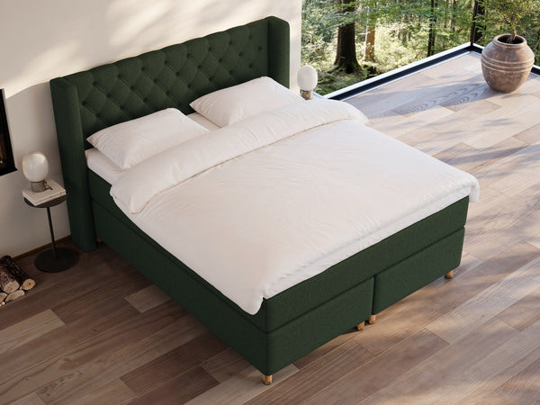 Eira Fjord 160x200 Mørkegrøn Nordic Dream tilbyr senger med skandinavisk design og materialer av høy kvalitet. Opplev perfekt komfort for en god natts søvn. Bestill din i dag!