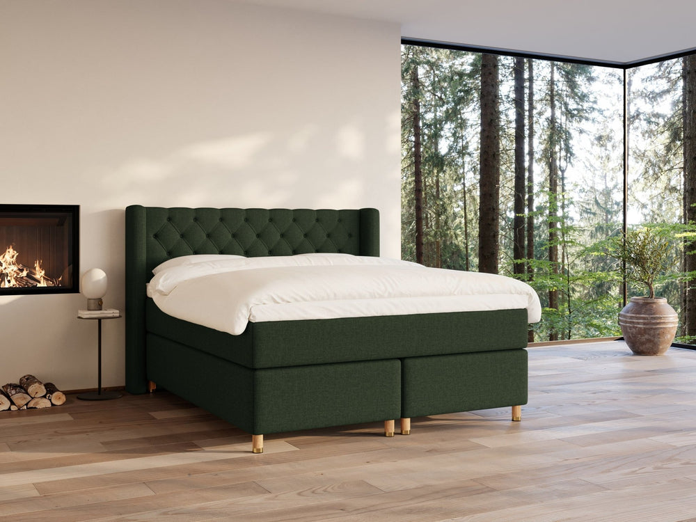 Eira Fjord 160x200 Mørkegrøn Nordic Dream tilbyr senger med skandinavisk design og materialer av høy kvalitet. Opplev perfekt komfort for en god natts søvn. Bestill din i dag!