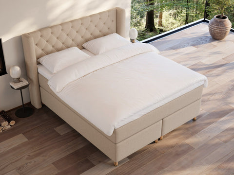 Eira Fjord 160x200 Sand Nordic Dream tilbyr senger med skandinavisk design og materialer av høy kvalitet. Opplev perfekt komfort for en god natts søvn. Bestill din i dag!