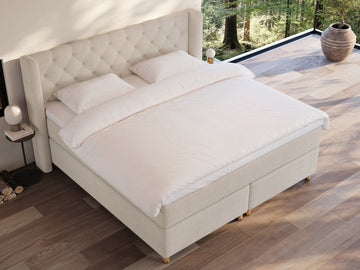Eira Fjord 220x220 Bouclé cream Nordic Dream tilbyr senger med skandinavisk design og materialer av høy kvalitet. Opplev perfekt komfort for en god natts søvn. Bestill din i dag!
