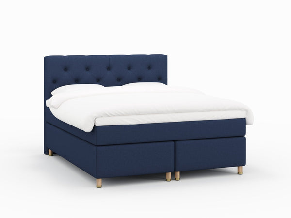 Nora Fjäll 160x200 Mørkeblå Nordic Dream tilbyr senger med skandinavisk design og materialer av høy kvalitet. Opplev perfekt komfort for en god natts søvn. Bestill din i dag!