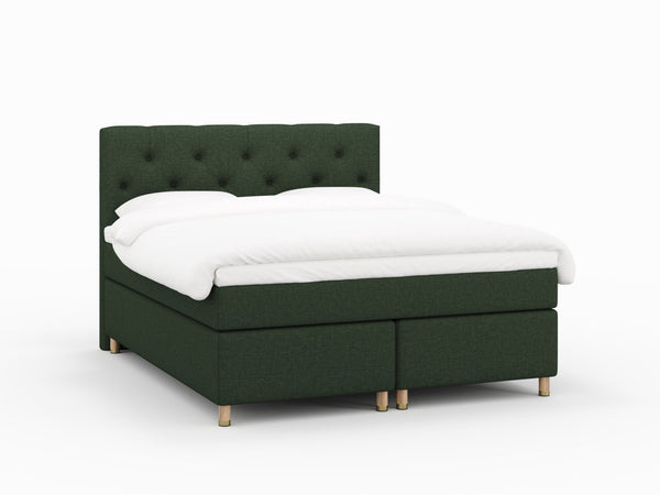 Nora Fjäll 160x200 Mørkegrøn Nordic Dream tilbyr senger med skandinavisk design og materialer av høy kvalitet. Opplev perfekt komfort for en god natts søvn. Bestill din i dag!