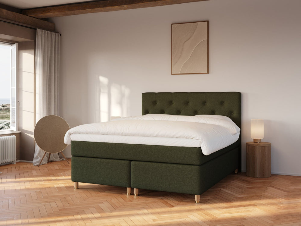 Nora Fjäll 160x200 Mørkegrøn Nordic Dream tilbyr senger med skandinavisk design og materialer av høy kvalitet. Opplev perfekt komfort for en god natts søvn. Bestill din i dag!