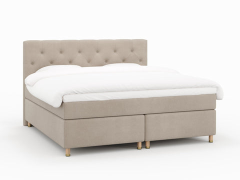 Nora Nordlys 200x200 Bouclé latte Nordic Dream tilbyr senger med skandinavisk design og materialer av høy kvalitet. Opplev perfekt komfort for en god natts søvn. Bestill din i dag!