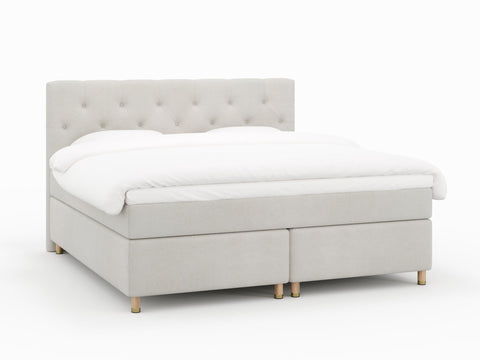 Nora Nordlys 210x210 Bouclé cream Nordic Dream tilbyr senger med skandinavisk design og materialer av høy kvalitet. Opplev perfekt komfort for en god natts søvn. Bestill din i dag!