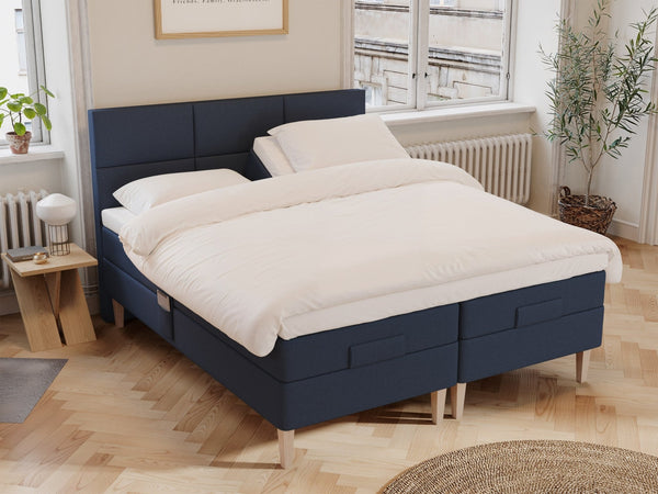 Ragna Älv 160x200 Mørkeblå Nordic Dream tilbyr senger med skandinavisk design og materialer av høy kvalitet. Opplev perfekt komfort for en god natts søvn. Bestill din i dag!