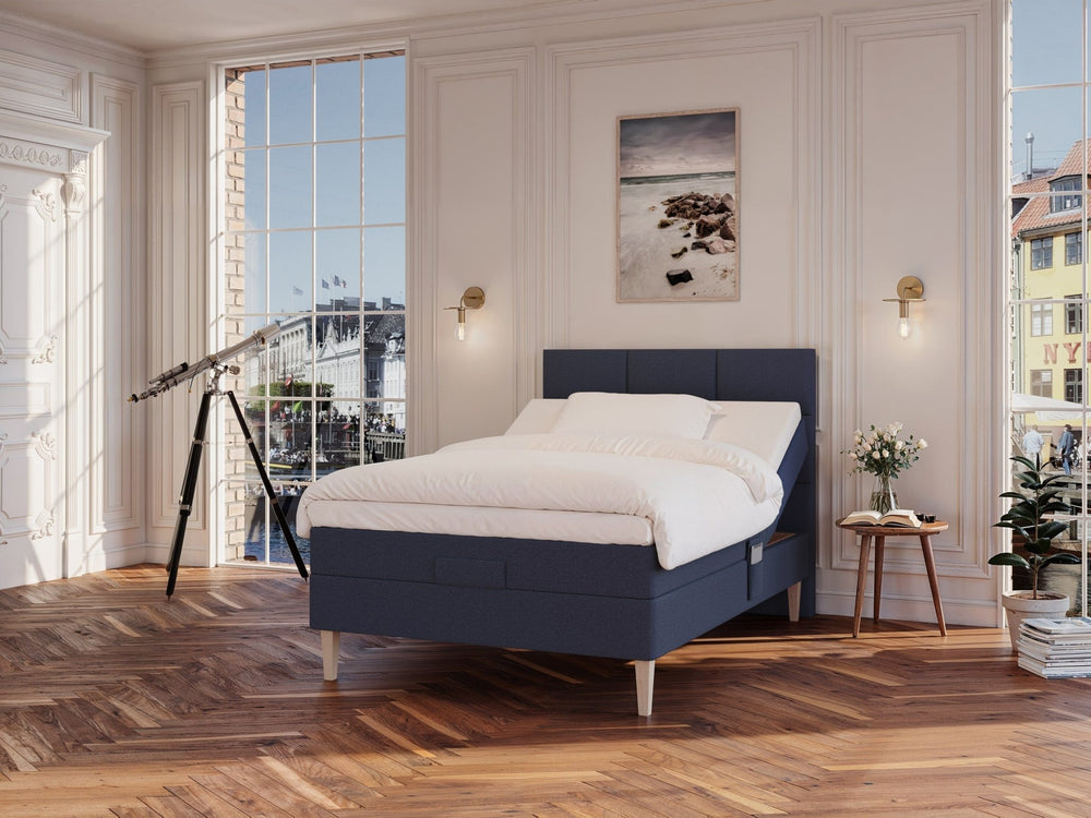 Ragna Nordlys 140x200 Mørkeblå Nordic Dream tilbyr senger med skandinavisk design og materialer av høy kvalitet. Opplev perfekt komfort for en god natts søvn. Bestill din i dag!