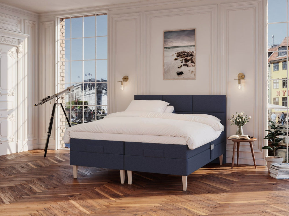 Ragna Nordlys 180x200 Mørkeblå Nordic Dream tilbyr senger med skandinavisk design og materialer av høy kvalitet. Opplev perfekt komfort for en god natts søvn. Bestill din i dag!