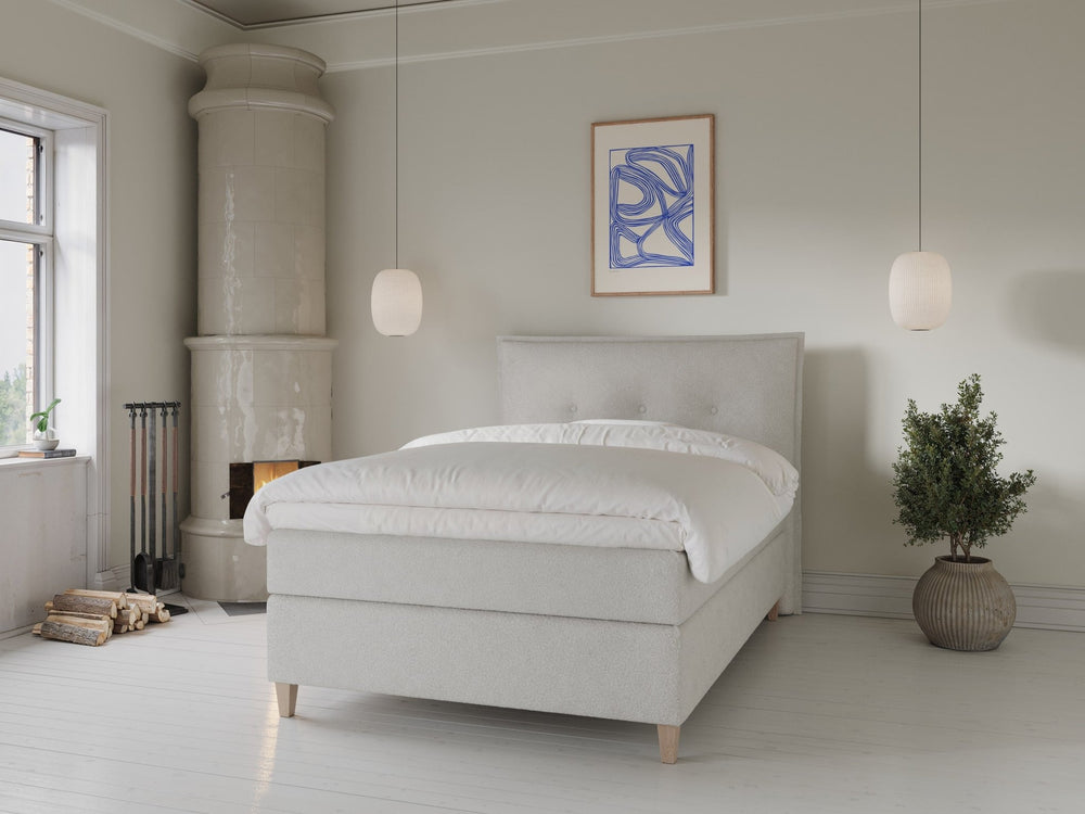 Snefrid Älv 120x200 Bouclé cream Nordic Dream tilbyr senger med skandinavisk design og materialer av høy kvalitet. Opplev perfekt komfort for en god natts søvn. Bestill din i dag!