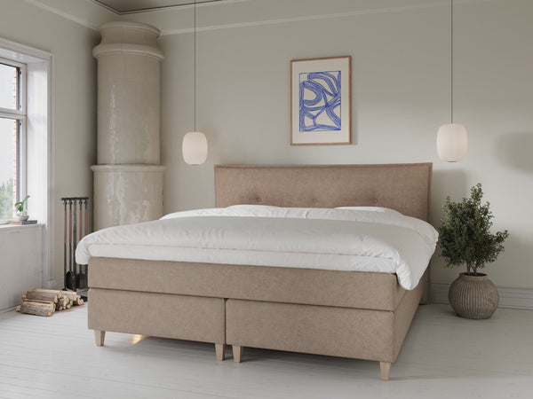 Snefrid Älv 200x200 Bouclé latte Nordic Dream tilbyr senger med skandinavisk design og materialer av høy kvalitet. Opplev perfekt komfort for en god natts søvn. Bestill din i dag!