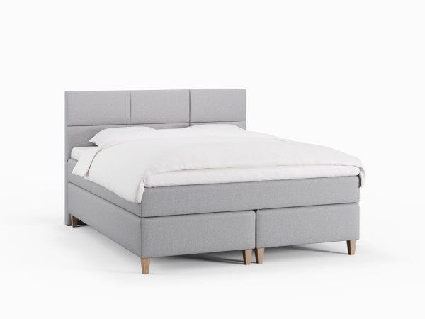 Snefrid Fjord 150x200 Lysegrå Nordic Dream tilbyr senger med skandinavisk design og materialer av høy kvalitet. Opplev perfekt komfort for en god natts søvn. Bestill din i dag!