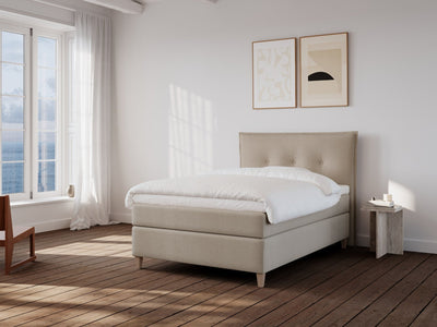 Snefrid Nordlys 120x200 Bouclé latte Nordic Dream tilbyr senger med skandinavisk design og materialer av høy kvalitet. Opplev perfekt komfort for en god natts søvn. Bestill din i dag!