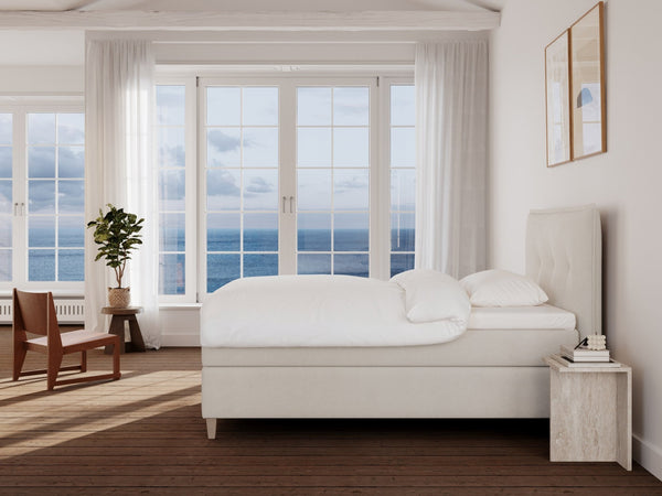 Snefrid Nordlys 140x210 Bouclé cream Nordic Dream tilbyr senger med skandinavisk design og materialer av høy kvalitet. Opplev perfekt komfort for en god natts søvn. Bestill din i dag!