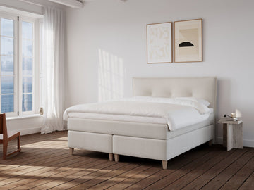 Snefrid Nordlys 160x200 Bouclé cream Nordic Dream tilbyr senger med skandinavisk design og materialer av høy kvalitet. Opplev perfekt komfort for en god natts søvn. Bestill din i dag!