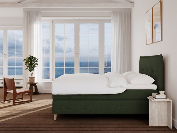 Snefrid Nordlys 160x200 Mørkegrøn Nordic Dream tilbyr senger med skandinavisk design og materialer av høy kvalitet. Opplev perfekt komfort for en god natts søvn. Bestill din i dag!