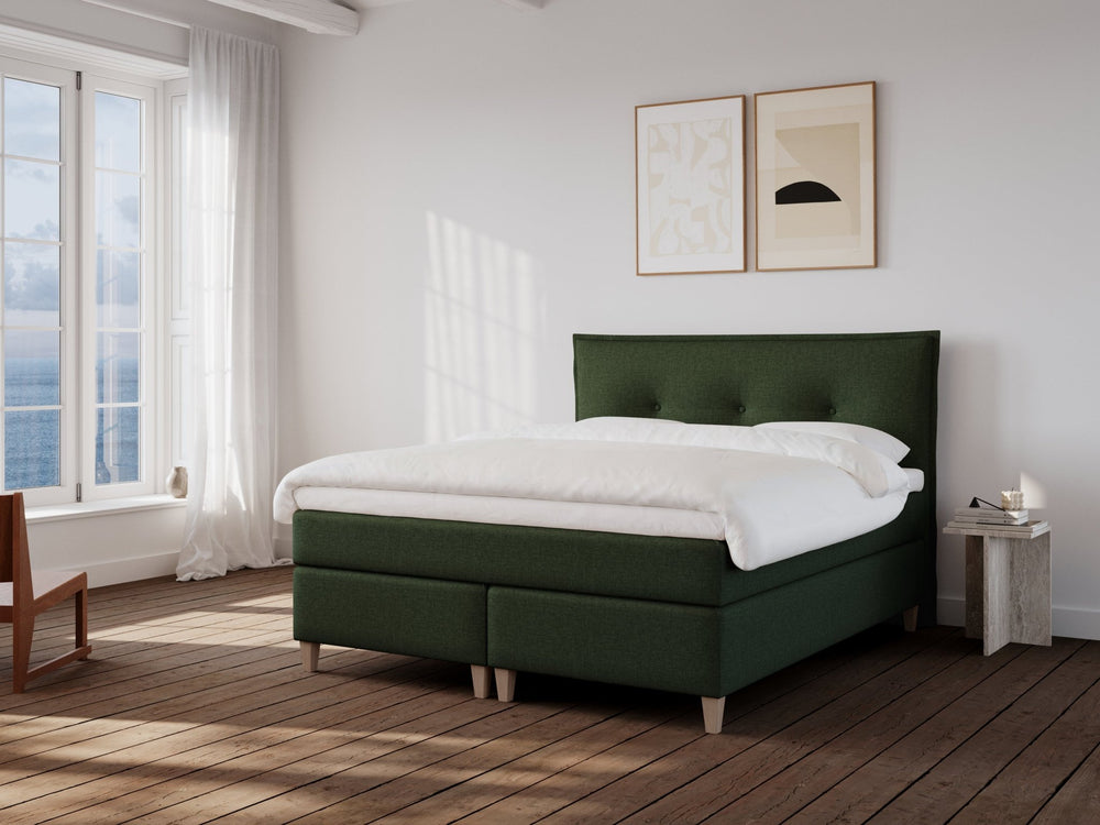 Snefrid Nordlys 160x210 Mørkegrøn Nordic Dream tilbyr senger med skandinavisk design og materialer av høy kvalitet. Opplev perfekt komfort for en god natts søvn. Bestill din i dag!