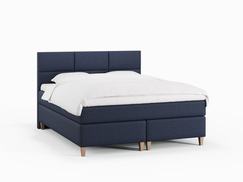 Snefrid Nordlys 180x200 Mørkeblå Nordic Dream tilbyr senger med skandinavisk design og materialer av høy kvalitet. Opplev perfekt komfort for en god natts søvn. Bestill din i dag!