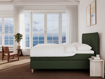 Snefrid Nordlys 210x210 Mørkegrøn Nordic Dream tilbyr senger med skandinavisk design og materialer av høy kvalitet. Opplev perfekt komfort for en god natts søvn. Bestill din i dag!