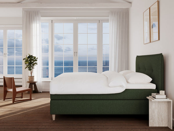 Snefrid Nordlys 210x210 Mørkegrøn Nordic Dream tilbyr senger med skandinavisk design og materialer av høy kvalitet. Opplev perfekt komfort for en god natts søvn. Bestill din i dag!