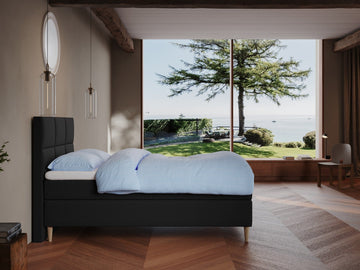 Svanhild Fjord 120x200 Antrasitt Nordic Dream tilbyr senger med skandinavisk design og materialer av høy kvalitet. Opplev perfekt komfort for en god natts søvn. Bestill din i dag!