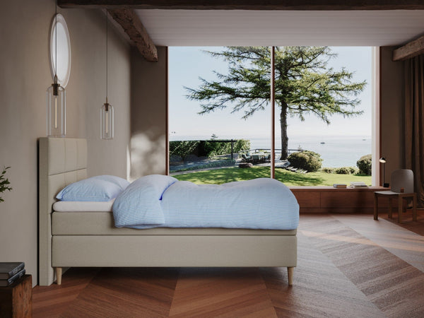 Svanhild Fjord 120x200 Sand Nordic Dream tilbyr senger med skandinavisk design og materialer av høy kvalitet. Opplev perfekt komfort for en god natts søvn. Bestill din i dag!