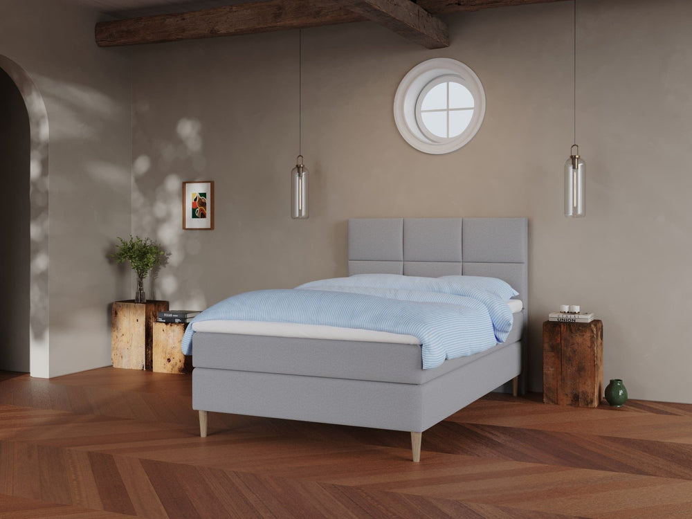 Svanhild Fjord 140x200 Lysegrå Nordic Dream tilbyr senger med skandinavisk design og materialer av høy kvalitet. Opplev perfekt komfort for en god natts søvn. Bestill din i dag!