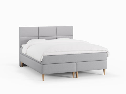 Svanhild Fjord 180x210 Lysegrå Nordic Dream tilbyr senger med skandinavisk design og materialer av høy kvalitet. Opplev perfekt komfort for en god natts søvn. Bestill din i dag!